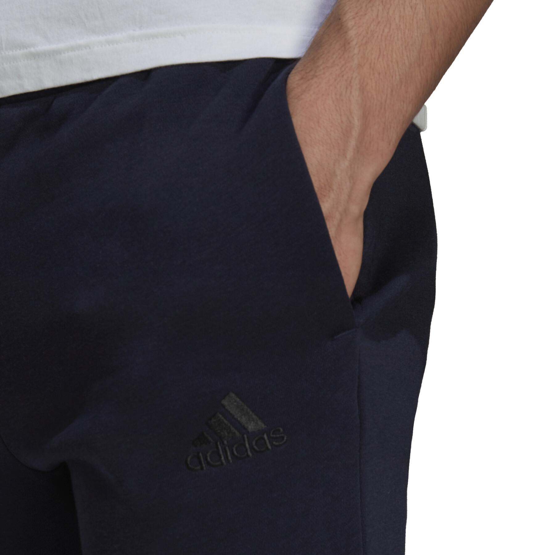 Pantalón de chándal adidas Essentials Fleece Tapered Cuff Logo